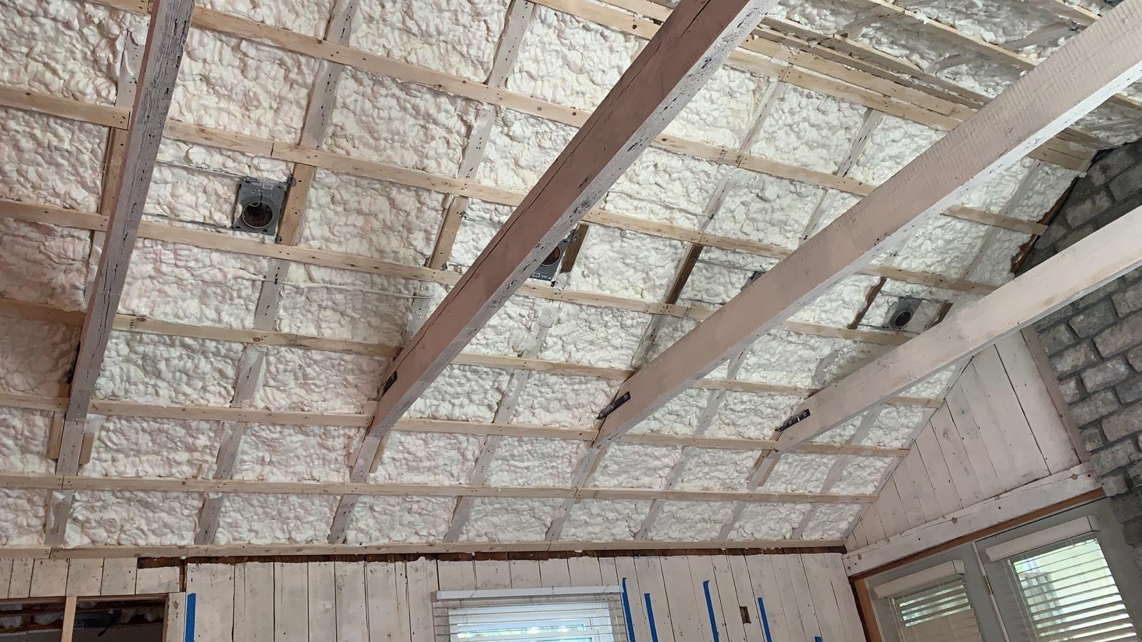 Peaked ceiling spray foam